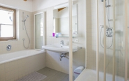 In-room Bathroom 5 Haus Wailand by Alpin Bookings