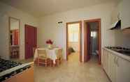 Phòng ngủ 5 Villaggio Turistico Defensola