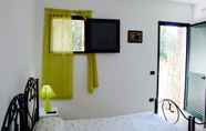 Kamar Tidur 4 Amoru Bed & Breakfast