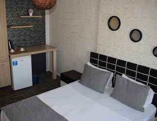 Bedroom 2 Mira Suites