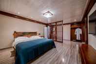 Bedroom Xijiang Village Vision Hotel