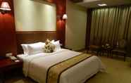 Kamar Tidur 2 Zhaona International Hotel