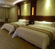 Bedroom 3 Zhaona International Hotel