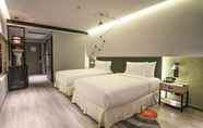 Kamar Tidur 3 Jinmao Hotel Xi'an Downtown