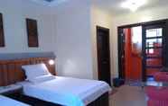 Kamar Tidur 6 Ferellee Beachfront Inn