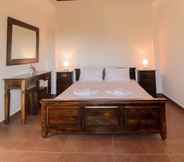 Kamar Tidur 6 Traditional Apartments Madares