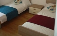 Kamar Tidur 4 Apartments Orange