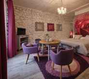 ห้องนอน 6 Chambres d'hôtes Le Moulin d'ô