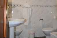 Phòng tắm bên trong Labella Hostal Restaurante