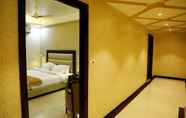 ห้องนอน 4 Landmark Hotel