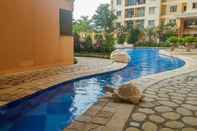 Swimming Pool Modern 2BR at City Home Apartment with Sofa Bed near MOI