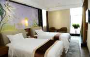 Bedroom 2 Guangzhou Joyous Seasons Hotel