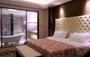 Kamar Tidur 2 Garman International Hotel
