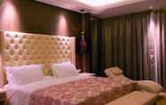 Kamar Tidur 3 Garman International Hotel
