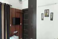 Bedroom Taksh Residency