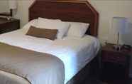 Bedroom 5 Travelodge by Wyndham Lovell/Bighorns