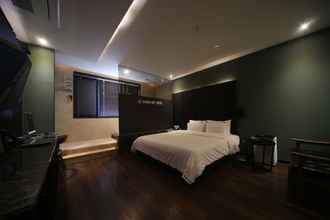 Kamar Tidur 4 Brown Dot Hotel Beomil