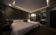 Bilik Tidur 5 Brown Dot Hotel Beomil