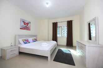 Kamar Tidur 4 Signature Holiday Home - Red Residence