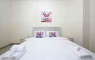 Kamar Tidur 6 Signature Holiday Home - Red Residence