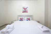 Kamar Tidur Signature Holiday Home - Red Residence