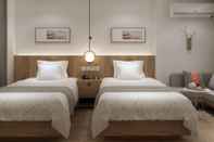 Bilik Tidur Happy Dragon City Culture Hotel (Tian'AnMen Forbidden City)