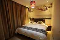 Kamar Tidur Happy Dragon Ally Hotel