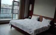 Kamar Tidur 4 Jinbote Holiday Hotel