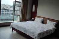 Kamar Tidur Jinbote Holiday Hotel