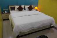 ห้องนอน Hotel Gitanjali Maldah