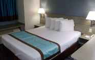 Bedroom 2 SureStay Hotel by Best Western Marienville