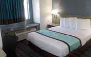 Bedroom 4 SureStay Hotel by Best Western Marienville