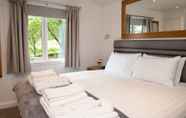 Kamar Tidur 3 Luxurious Super-king Lodge With hot tub