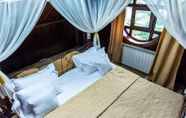 Bedroom 5 Predeal Comfort Suites
