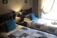 Phòng ngủ Ingwenya Lodge