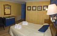 Phòng ngủ 4 Hotel Arha Villa de Suances
