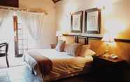 Bedroom 7 Coral Tree Inn