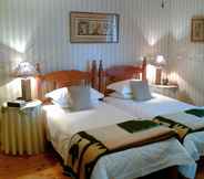 Kamar Tidur 6 Airlies Guest House