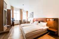 Phòng ngủ Aparthotel Altes Dresden