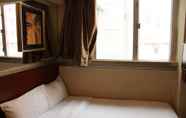 Kamar Tidur 4 Oriental Lander Hotel