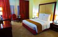 Bedroom 7 Grand Regal Hotel
