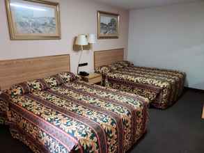 Bedroom 4 River Heights Motel