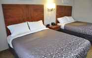 Bedroom 4 Moonlight Inn and Suites