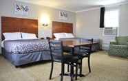 Bedroom 3 Moonlight Inn and Suites
