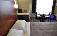Bedroom 6 Moonlight Inn and Suites
