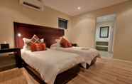 Bilik Tidur 4 Ibhayi Guest Lodge - Lion Roars Hotels & Lodge