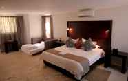 Kamar Tidur 3 Ibhayi Guest Lodge - Lion Roars Hotels & Lodge