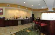 Restaurant 4 Days Inn & Suites by Wyndham Houston / West Energy Corridor