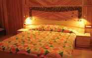 Phòng ngủ 7 Mountain Club Bhimtal