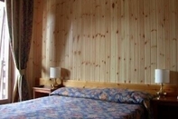 Bedroom Avalanche - Alpine Boutique Hotel